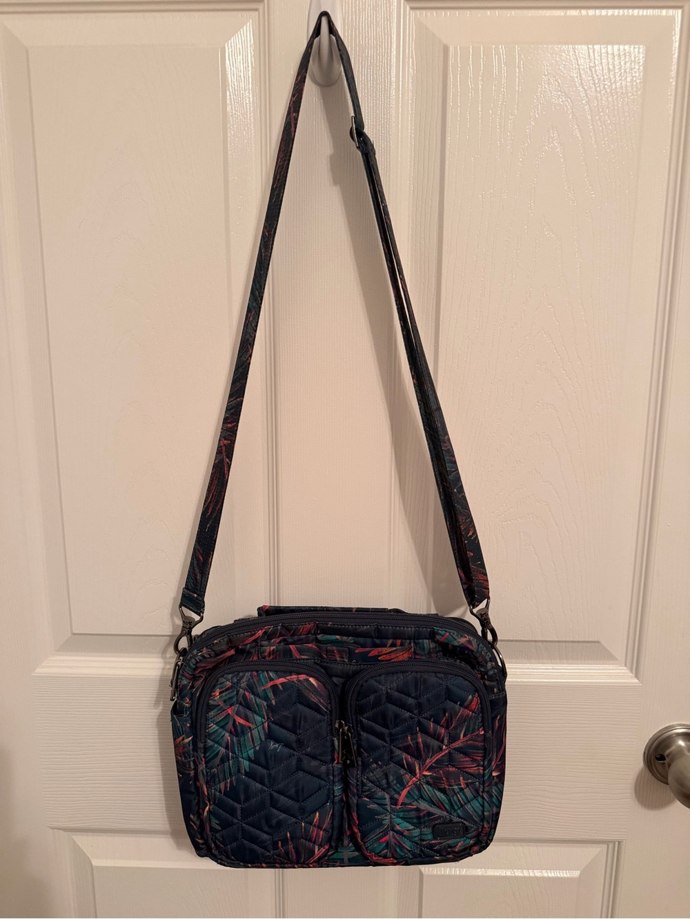 lug Quilted Navy Navigator Crossbody with Tropical Leaf Accent
